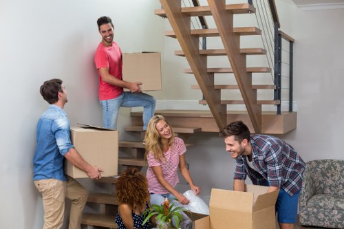Removal van and moving team preparing a local move in Tottenham Hale
