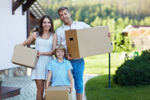 Packed boxes and furniture ready for local removal service